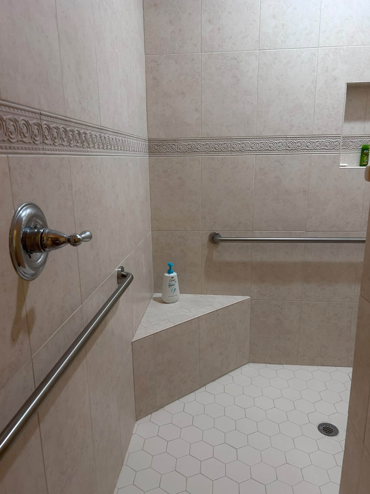 Beige tile walk-in shower