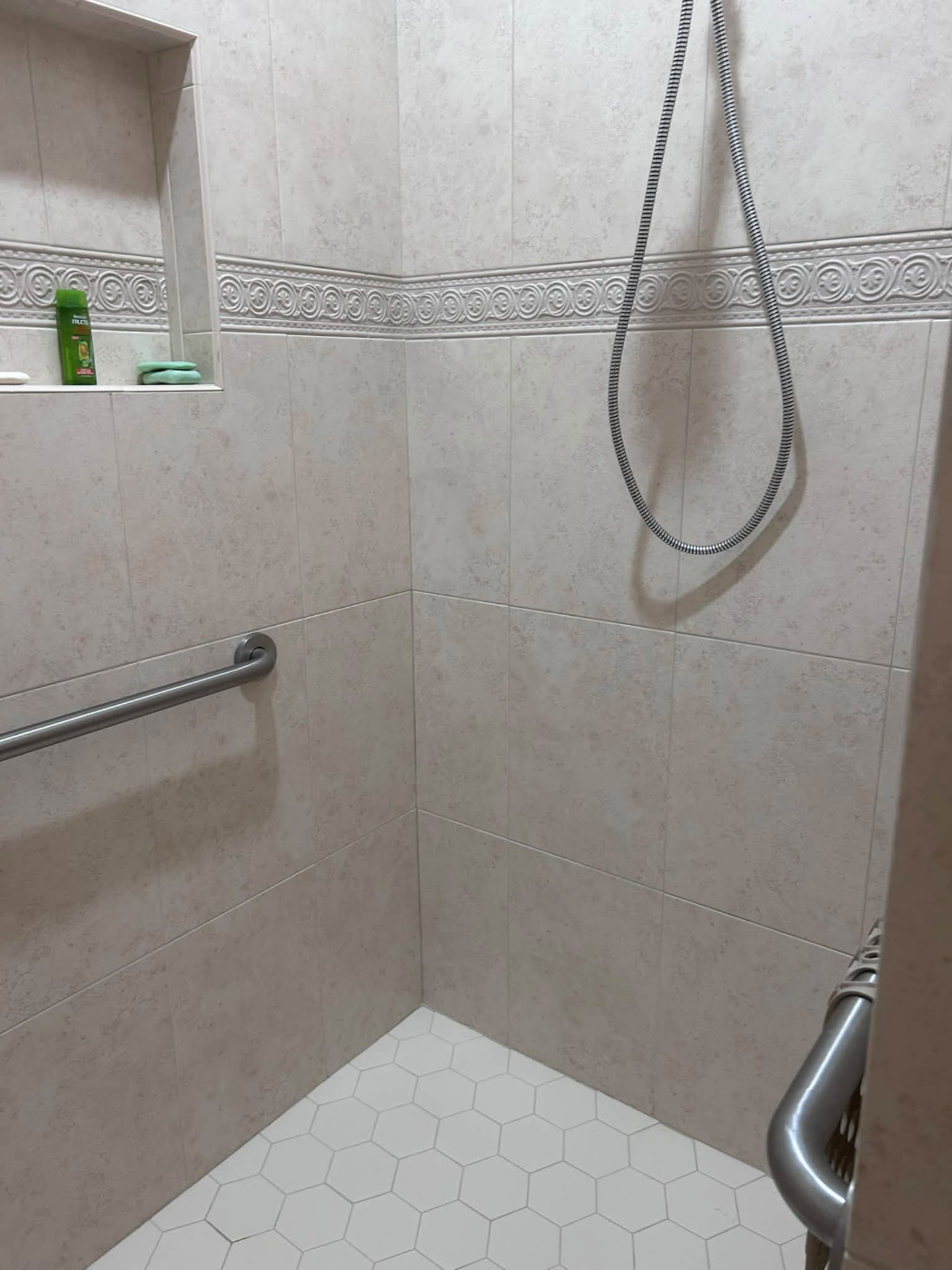 Beige tile walk-in shower